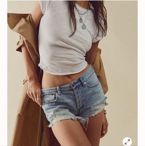 We The Free Loving Good Vibrations distressed exposed pockets frayed short